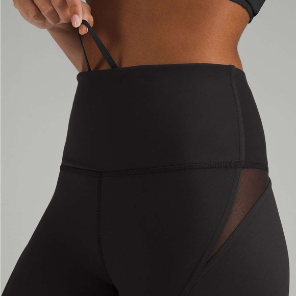 Lululemon Wunder Train Mesh Panel High-Rise Tight 25"
Black - Picture 2 of 11